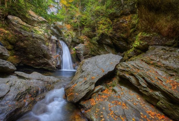 Bingham Falls; Emerald pools and overhanging rocks make Bingham Falls a magical destination.